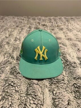 New York Yankees Teal Snapback Hat with Yellow Logo